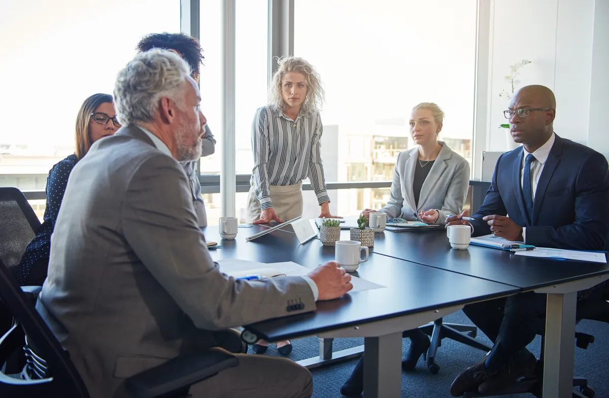 AI Elevate team discussing strategy